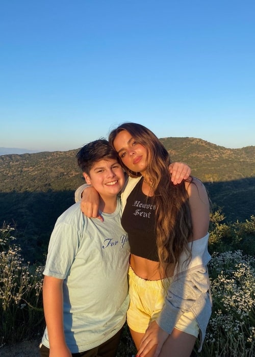 Enzo Lopez smiling for a picture alongside his sister Addison Rae in May 2020