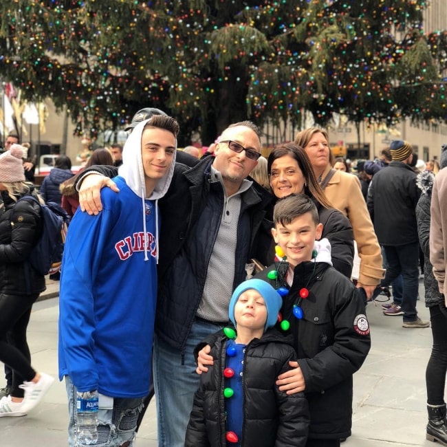Jordan Licausi as seen in a picture with his parents and younger brother Jayden and Jacob Licaus in New York City in December 2018