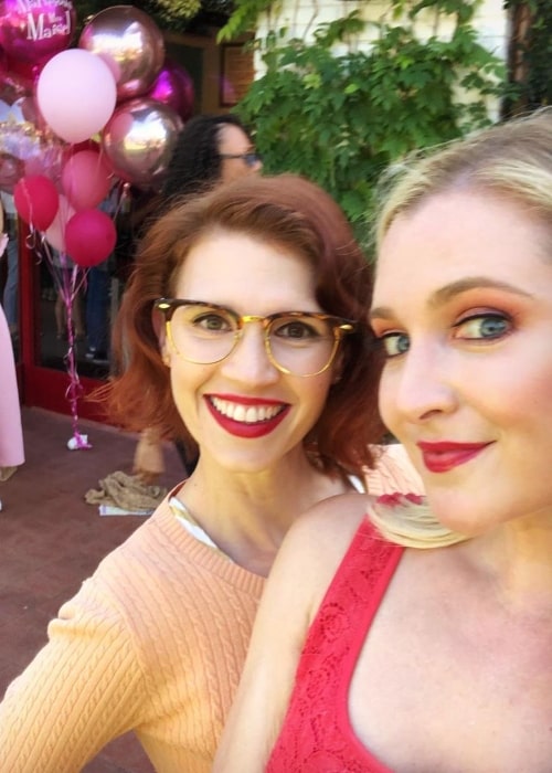 Julie McNiven (Left) as seen while smiling in a selfie alongside Katherine Bailess in August 2019