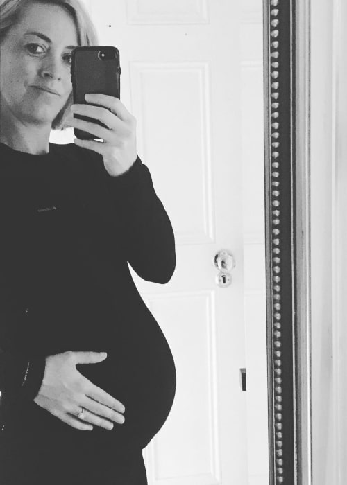 Kathryn Thomas showing off her baby bump in March 2018