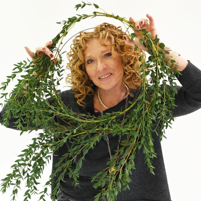 Kelly Hoppen in December 2019 talking about posting Christmas tips on decorating the tree as well as on wreath making