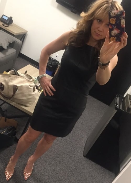 Megyn Price as seen while clicking a mirror selfie in April 2018