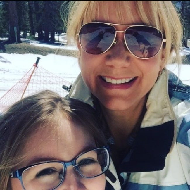 Megyn Price smiling in a selfie alongside her daughter as they enjoy their time at Mammoth Mountain Inn in California, United States