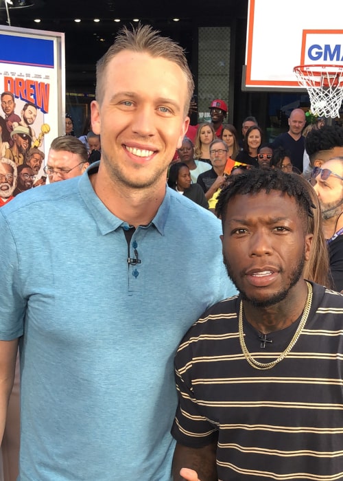 Nick Foles with American basketball player Nate Robinson, as seen in June 2018