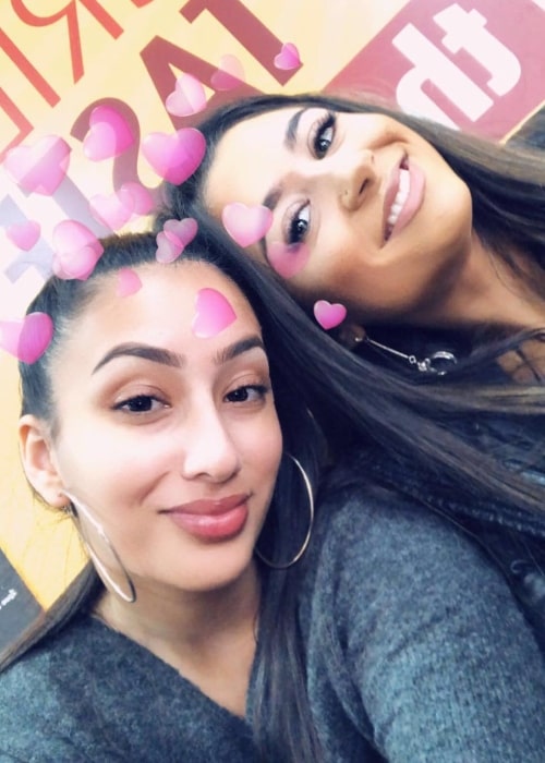 Safaa Malik (Right) smiling in a selfie alongside her friend in April 2019