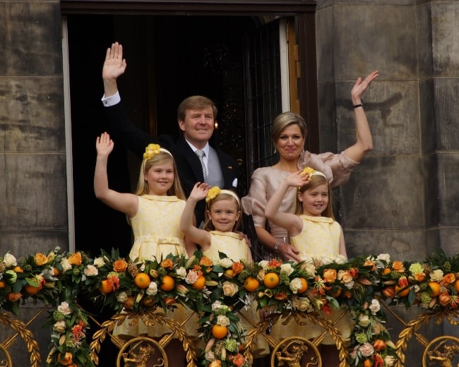 Willem-Alexander of the Netherlands, Queen Maxima, and Princesses Catharina-Amalia, Alexia, and Ariane during the balcony scene after the abdication of Beatrix on April 30, 2013