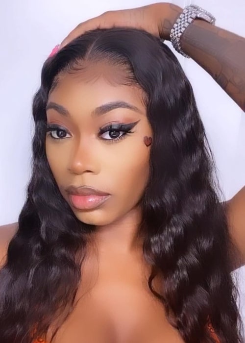 Asian Doll as seen while clicking a selfie to show her face tattoo in October 2020