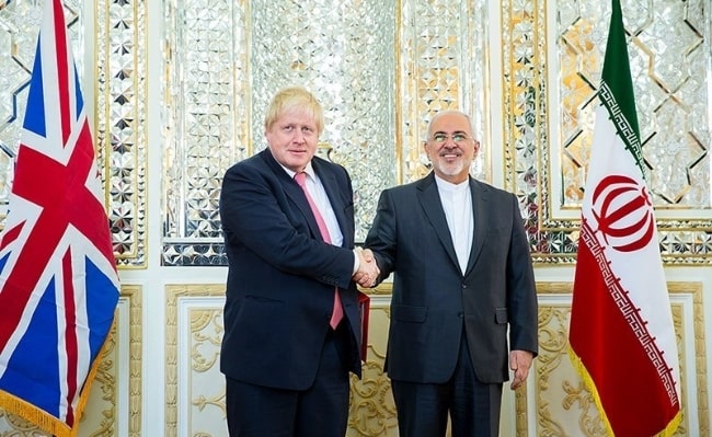 Boris Johnson (Left) meeting Iranian foreign minister Mohammad Javad Zarif in December 2017