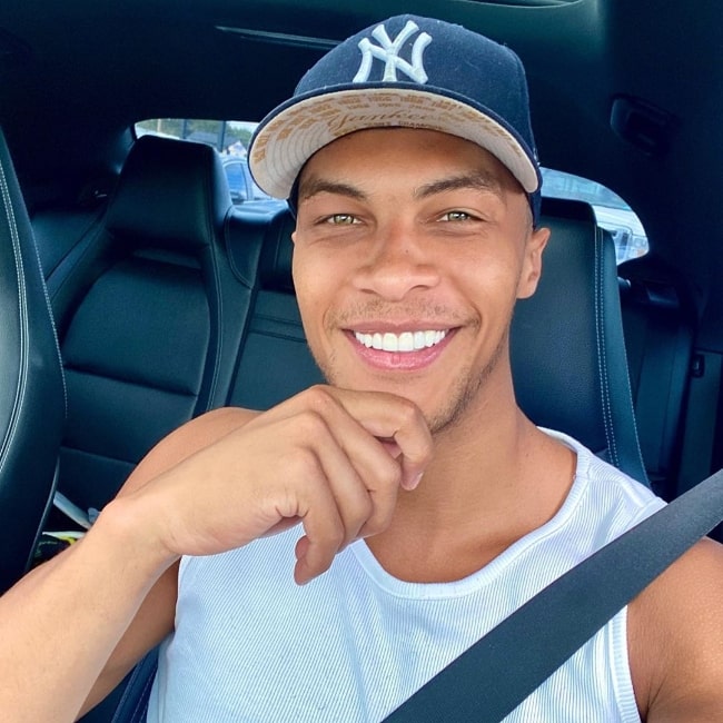 Dale Moss as seen while smiling in a car selfie in Manhattan, New York in September 2020