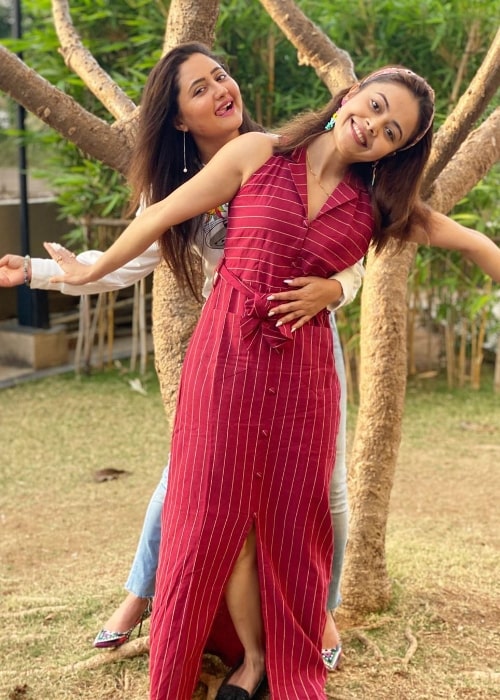 Devoleena Bhattacharjee (Front) smiling in a picture alongside Rashami Desai in March 2020