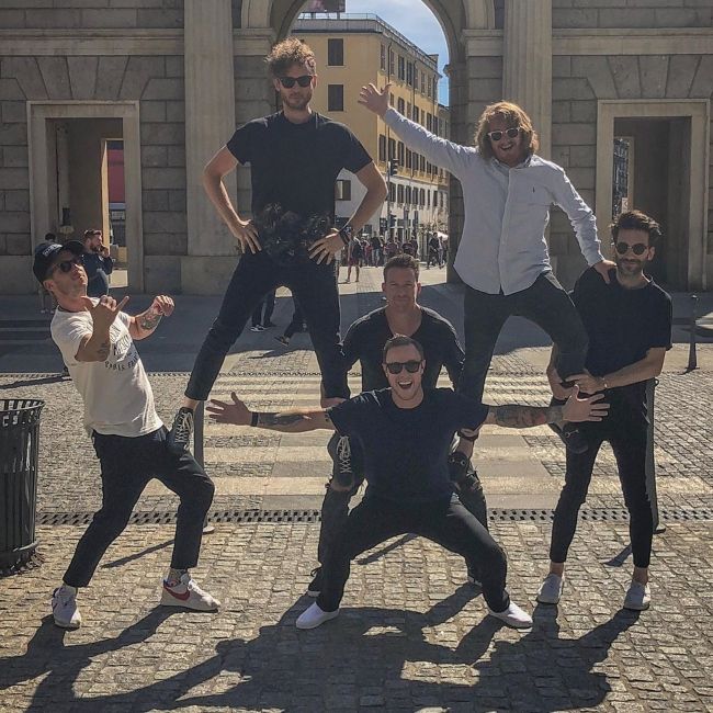 Drew Brown (top right) as seen in Milan, Italy with his bandmates