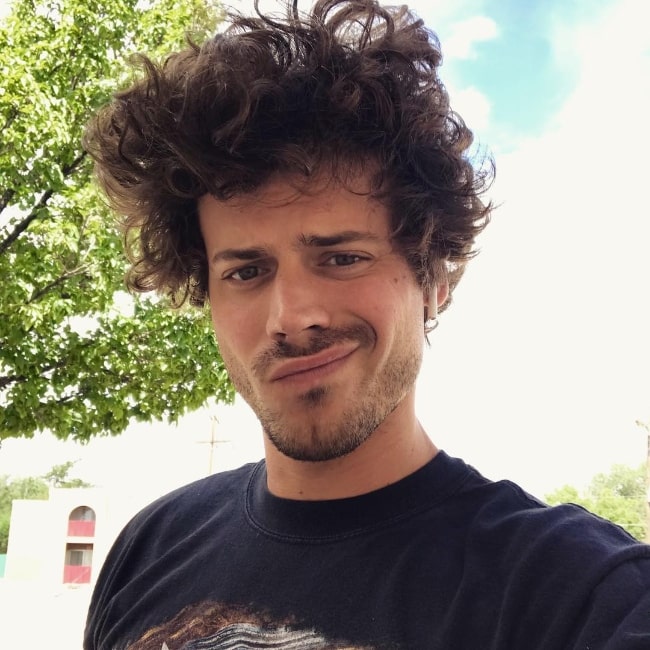 François Arnaud clicking a selfie in July 2018