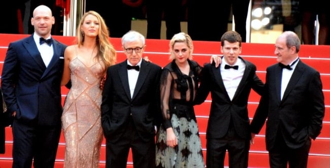 From Left to Right - Corey Stoll, Blake Lively, Woody Allen, Kristen Stewart, Jesse Eisenberg, and Pierre Lescure posing for the camera as the cast and crew of 'Café Society' at the 2016 Cannes Film Festival