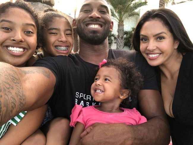 Gianna (second from left) as seen in a selfie with her family