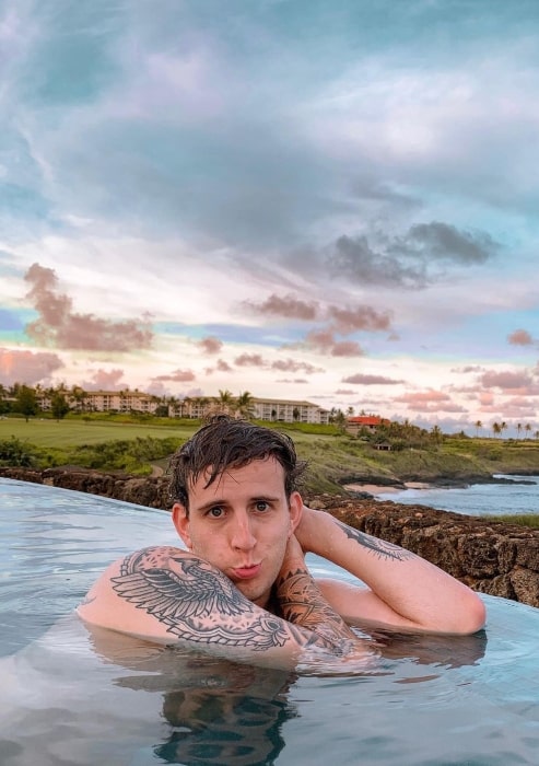 Illenium enjoying himself in the water in July 2019