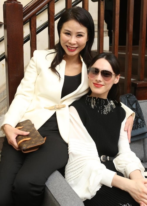 Isabella Leong (Right) as seen while smiling for a picture alongside her friend in Tai Kwun