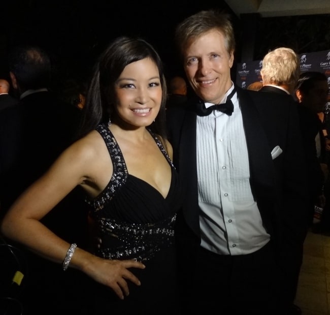 Jack Wagner smiling for a picture alongside 5 FM and SABC3 Expresso reporter Jen Su in November 2012