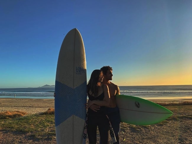 Jordi Webber with Holli Hughes at Te Arai Reserve Beach in New Zealand in March 2020