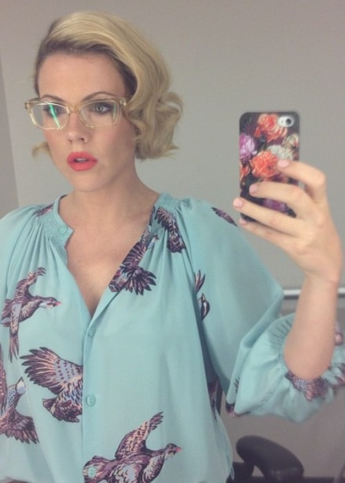 Kathleen Robertson in August 2012 wondering whether to wear glasses or no for the press conference