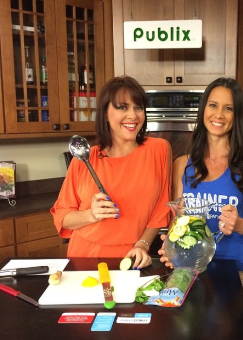 Leanza Cornett (left), on the sets of a talk show, in April 2015