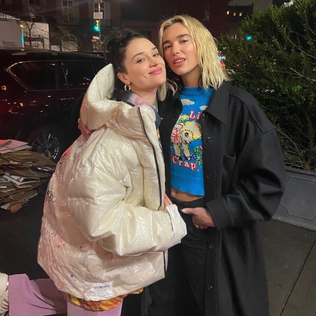 Lolo Zouaï (Left) posing for a picture alongside Dua Lipa in January 2020