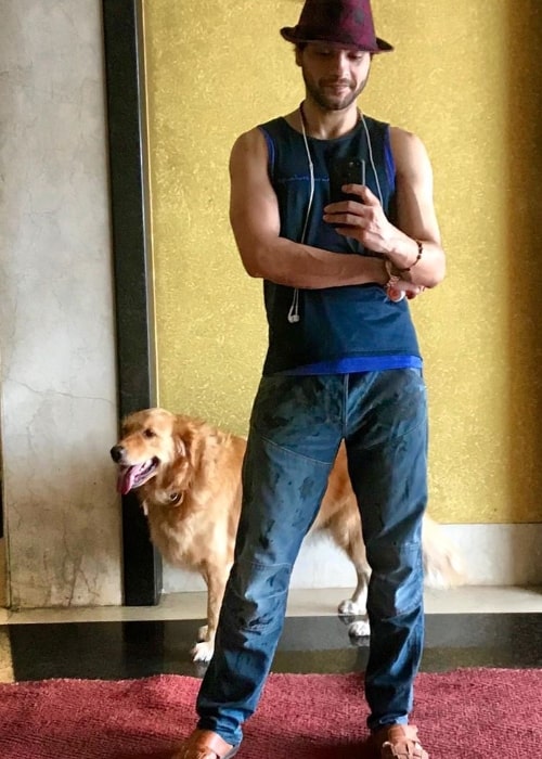 Mishal Raheja as seen while taking a mirror selfie with his dog Angie in June 2020