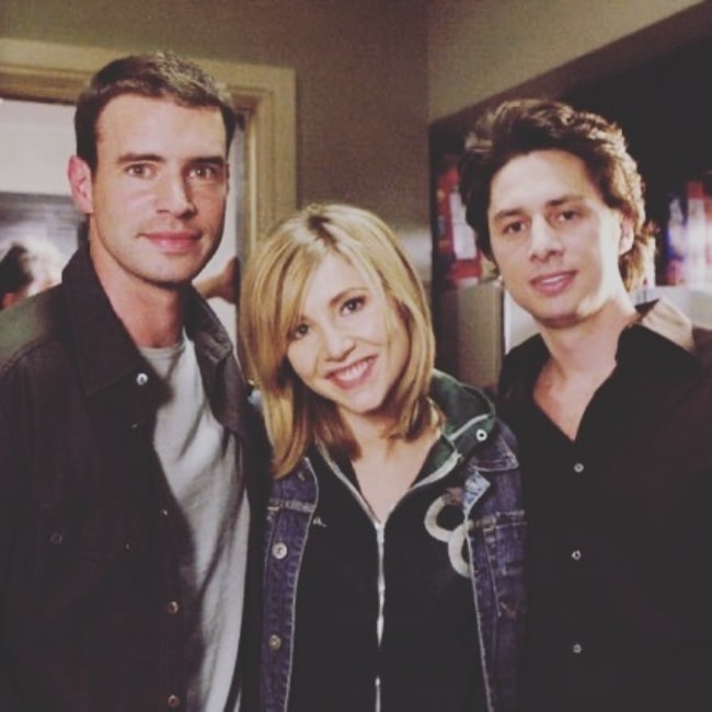 Scott Foley (Left) posing for a picture with Sarah Chalke and Zach Braff