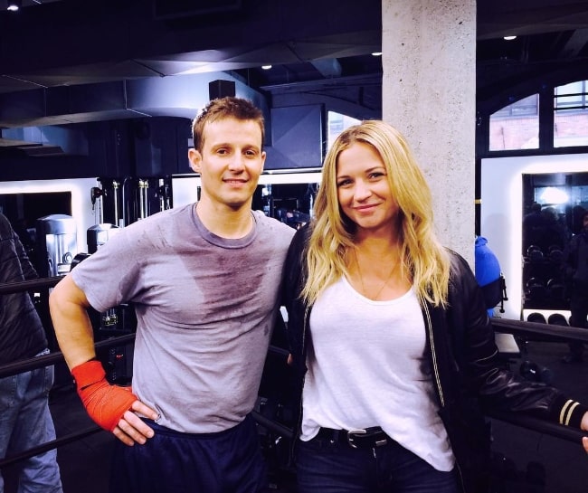 Will Estes and Vanessa Ray posing for a picture during a workout in October 2016