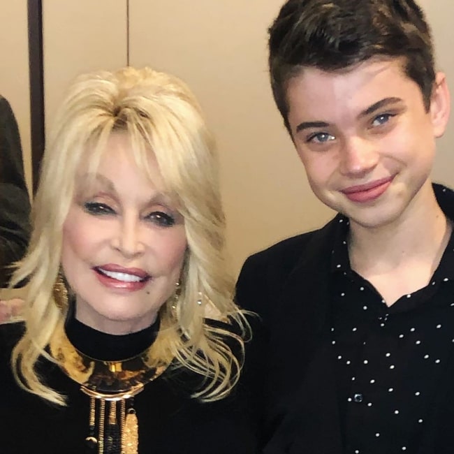 Aidan Langford as seen in a picture with singer and songwriter Dolly Parton in November 2019