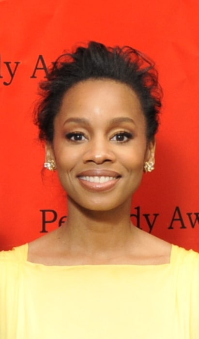 Anika Noni Rose smiling for a picture at the 69th Annual Peabody Awards Luncheon at Waldorf Astoria Hotel New York on May 17, 2010