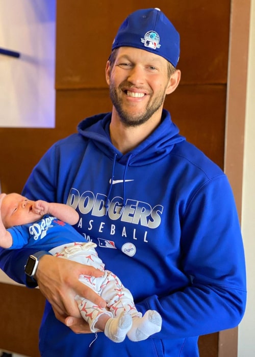 Clayton Kershaw with his 3rd child, as seen in March 2020