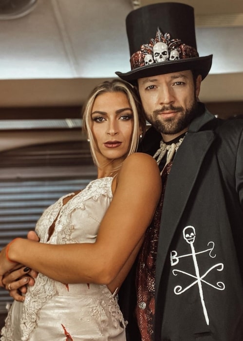 Daniella Karagach in October 2020 with her husband wishing everyone a happy Halloween