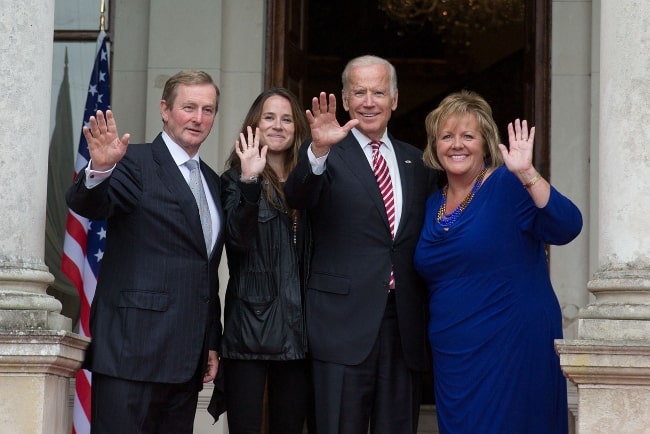 From Left to Right - Taoiseach Enda Kenny, Ashley Biden, Joe Biden, and Mrs. Fionnuala O'Kelly waving to the press after a luncheon hosted by the Taoiseach at Farmleigh House in Dublin, Ireland in June 2016
