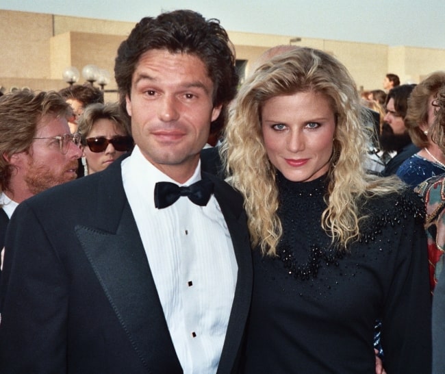 Harry Hamlin posing for the camera along with then-wife, Laura Johnson at the 1987 Emmy Awards