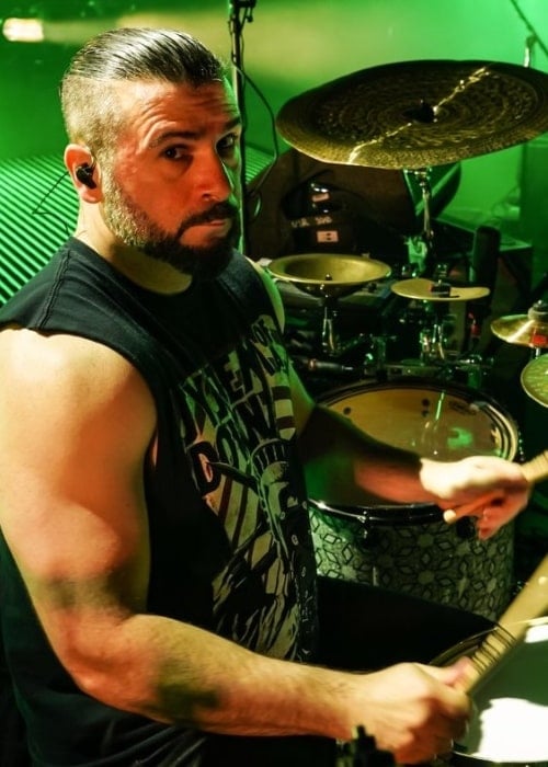 John Dolmayan as seen while playing the drums on stage in January 2018