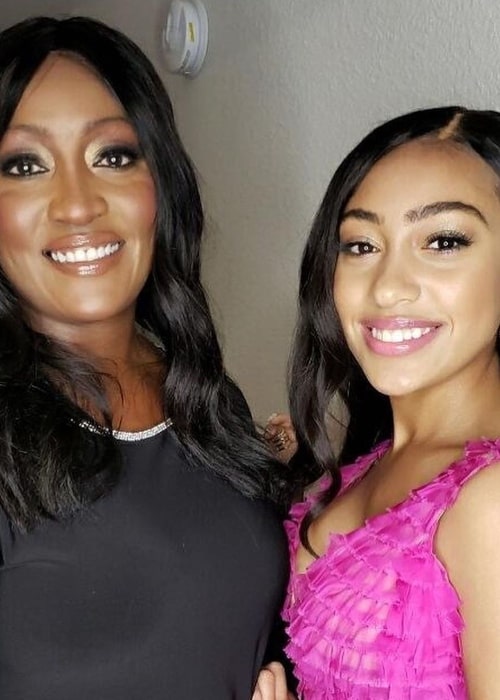 Lexi Underwood as seen while smiling in a picture alongside her mother