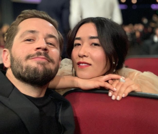 Maya Erskine as seen while smiling in a picture alongside Michael Angarano in September 2019