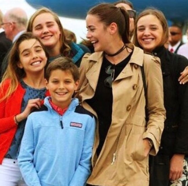 Natalie Biden (In Red) in a picture with her family