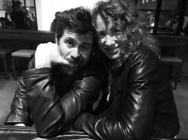 Rick Gomez in a black-and-white picture with his wife Jenifer Wymore