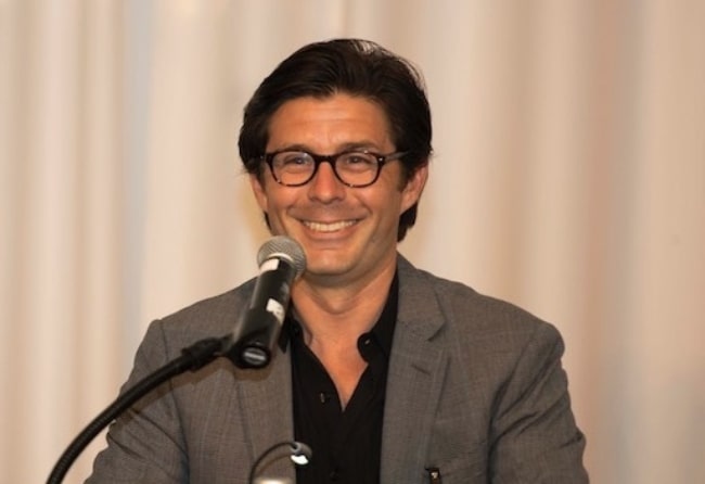 Rick Gomez pictured while presenting an award at CayFilm 2015