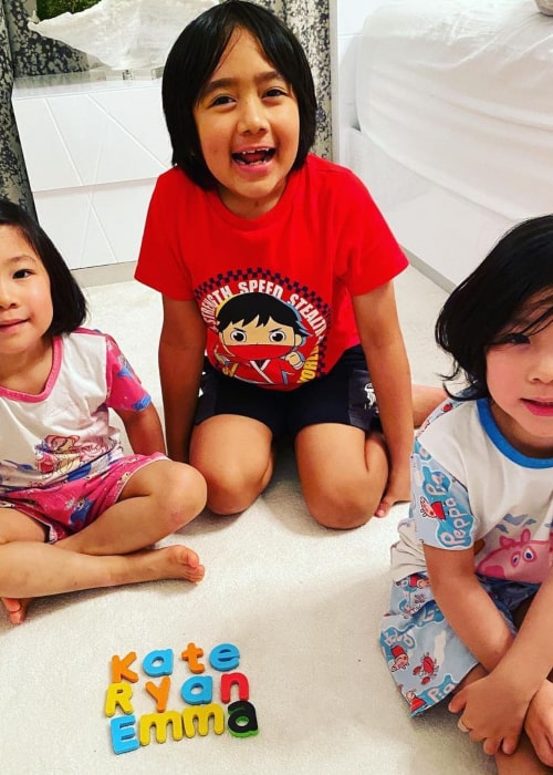 Ryan Kaji with his younger sisters, Emma and Kate, as seen in November 2020