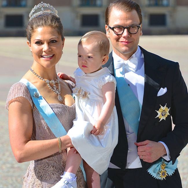 Victoria as seen with Prince Daniel, and Princess Estelle in 2013