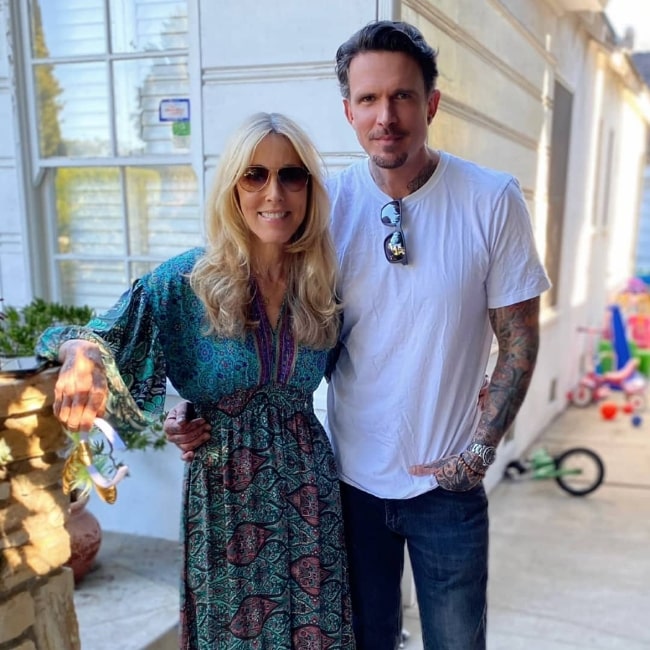 Alana Stewart posing for a picture alongside her son Ashley Hamilton at a birthday party for her granddaughter Willow in November 2020