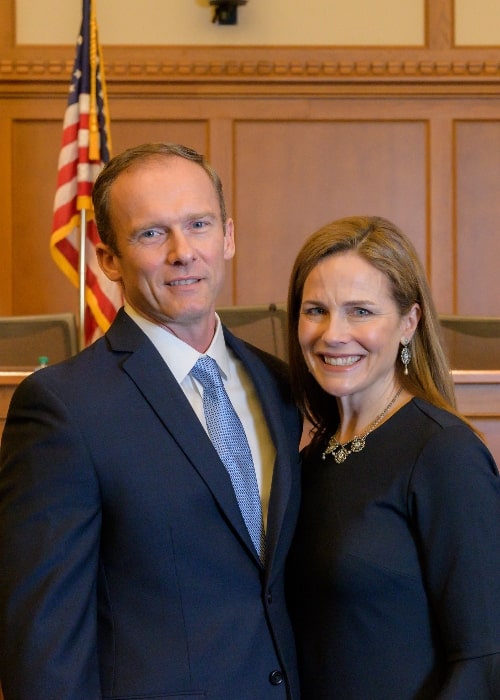 Amy Coney Barrett as seen while posing for a picture with her husband Jesse M. Barrett in February 2018