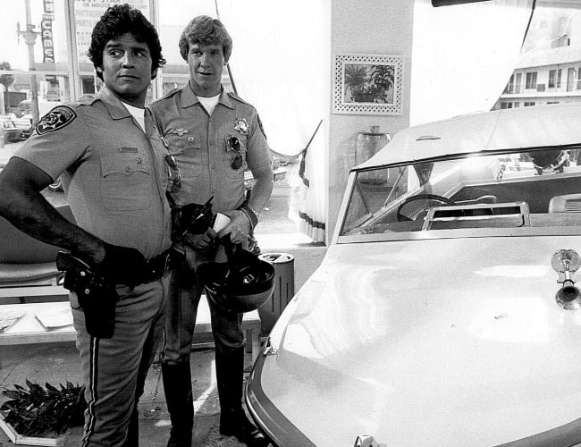 Erik Estrada (Left) as 'Ponch Poncherello' and Larry Wilcox as 'Jon Baker' from the television series 'CHiPS'