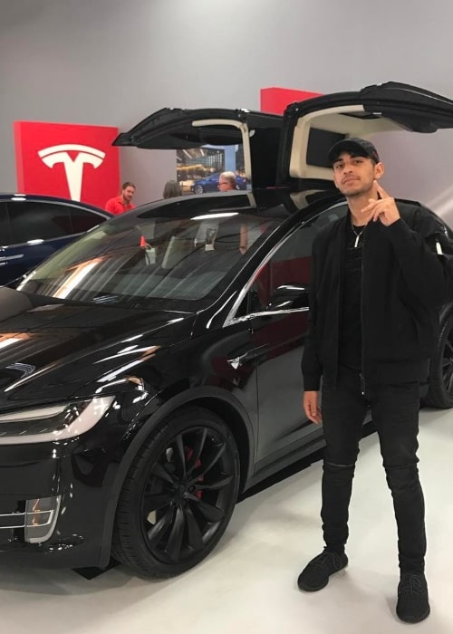 FaZe Rain as seen in a picture that was taken at a Tesla showroom in March 2017