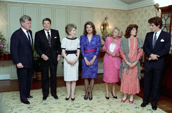 From Left - Ted Kennedy, Ronald Reagan, Nancy Reagan, Jacqueline Kennedy Onassis, Ethel Kennedy, Caroline Kennedy, and John F. Kennedy Jr. at a reception for The John F. Kennedy Library Foundation in 1985