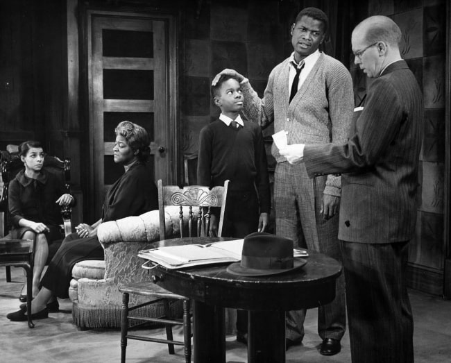 From Left to Right - Ruby Dee, Claudia McNeil, Glynn Turman, Sidney Poitier, and John Fiedler in a scene from the play 'A Raisin in the Sun'