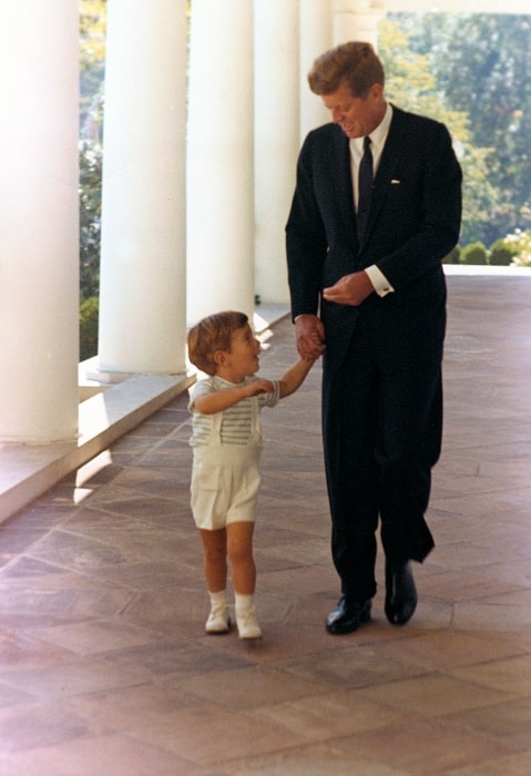 John F. Kennedy Jr. with his father John F. Kennedy at the White House in 1963