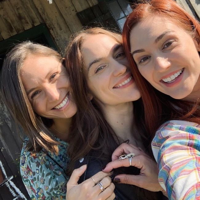 Katherine Barrell as seen in a selfie that was taken with Dominique Provost-Chalkley and Melanie Scrofano in September 2020